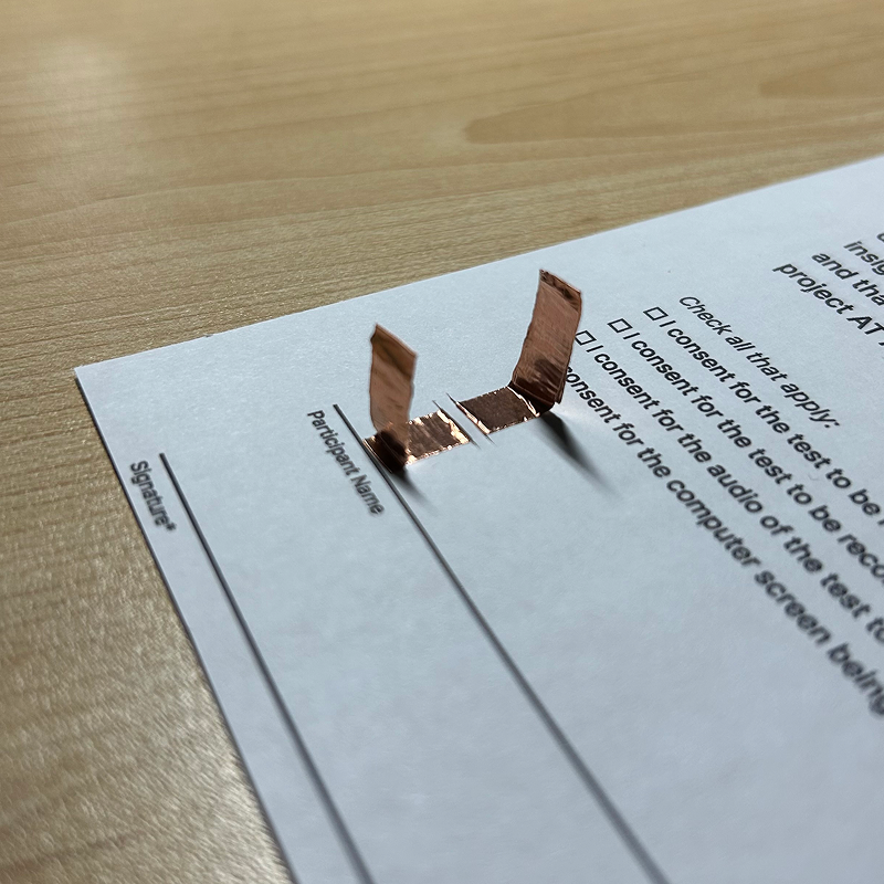 These tabs were quite flimsy and thin since it is just two layers of tape, so if I were to remake this, I might add a layer of paper or plastic in between the layers to make it more durable.