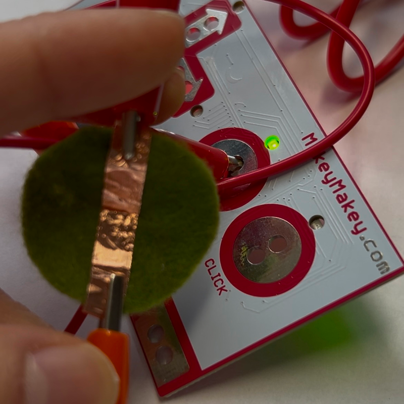 Instead of cutting two slits, I wanted to try one, which ended up connect when it wasn't pressed as assumed. It created an interesting interaction where the sitch is automatically on and the user has to manually stretch the fabric to turn the swtich off.